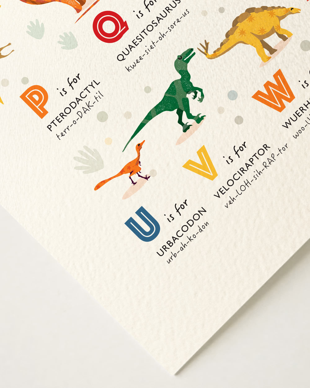 Children's educational poster with colorful dinosaurs and alphabet letters and the phonetic pronunciations of the names on a light background