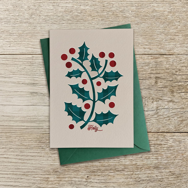 Contemporary holly Christmas card with illustrated holly leaves and berries